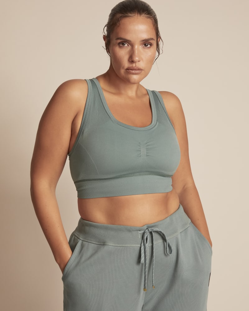 Front of a model wearing a size 1X 11 Honoré x Adidas Formotion Bra in Light Blue by Adidas x 11 Honoré. | dia_product_style_image_id:245723
